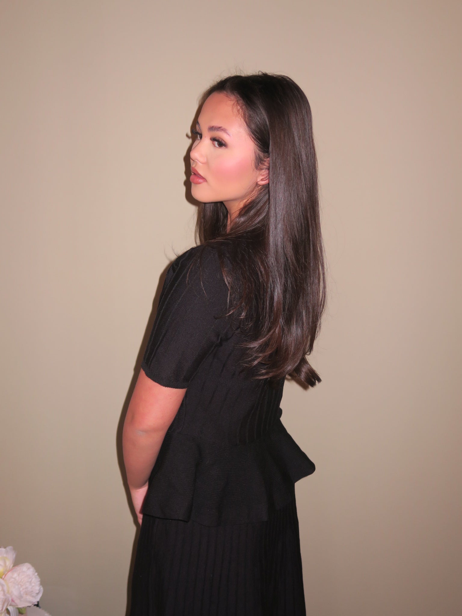 Brown sleeveless buttoned vest with matching two-piece skirt featuring straight top and pleated flared bottom