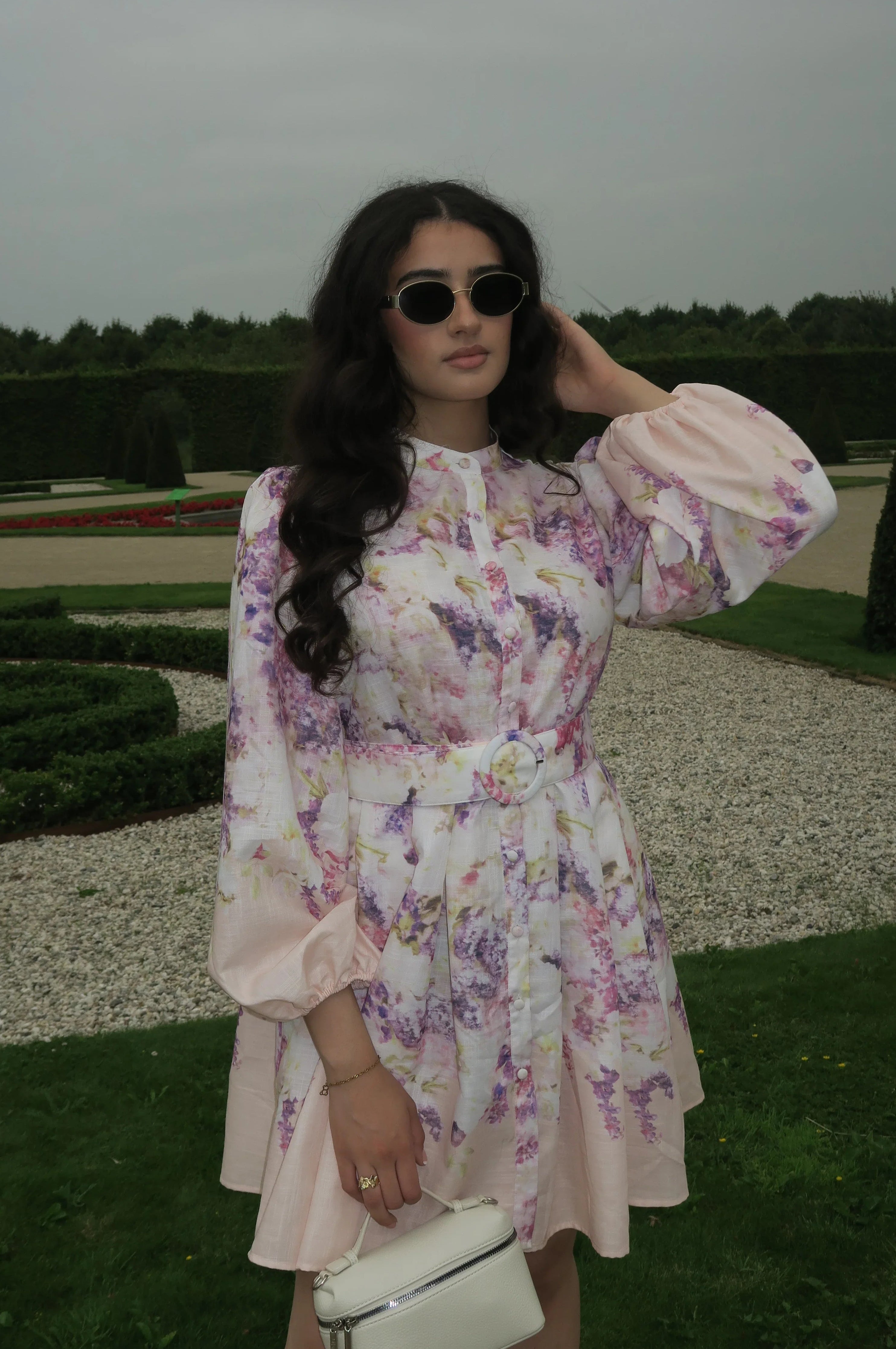 The Éclat Dress front view – floral full-length gown