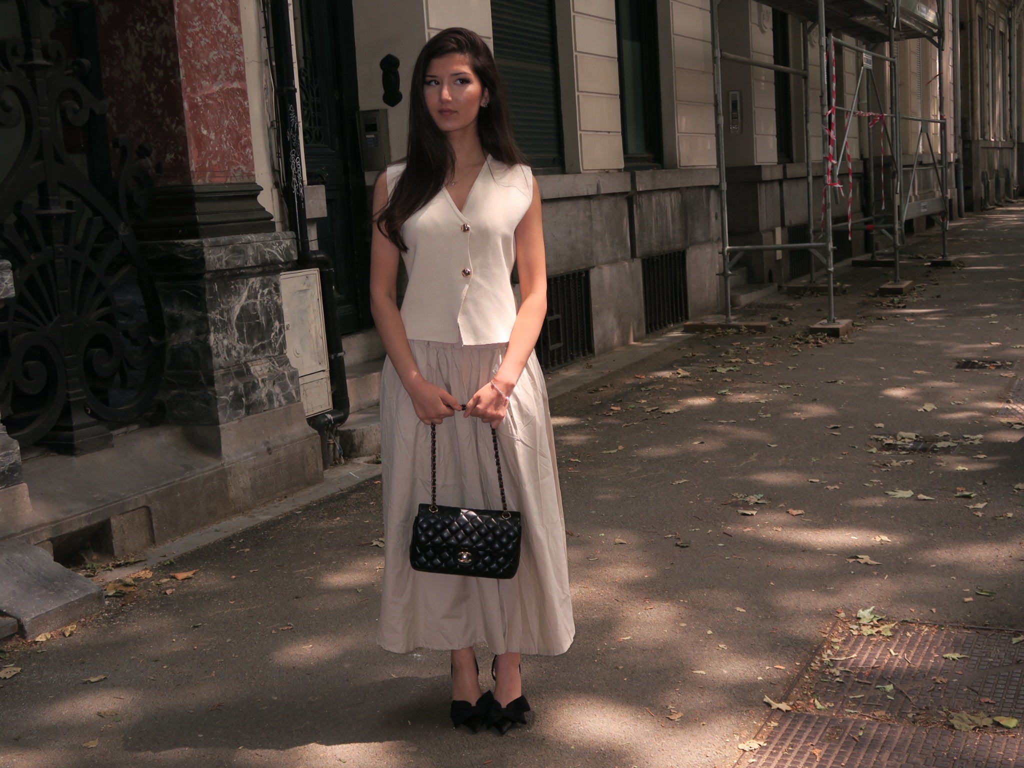 Elegant Sleeveless Top with gold accents front view
