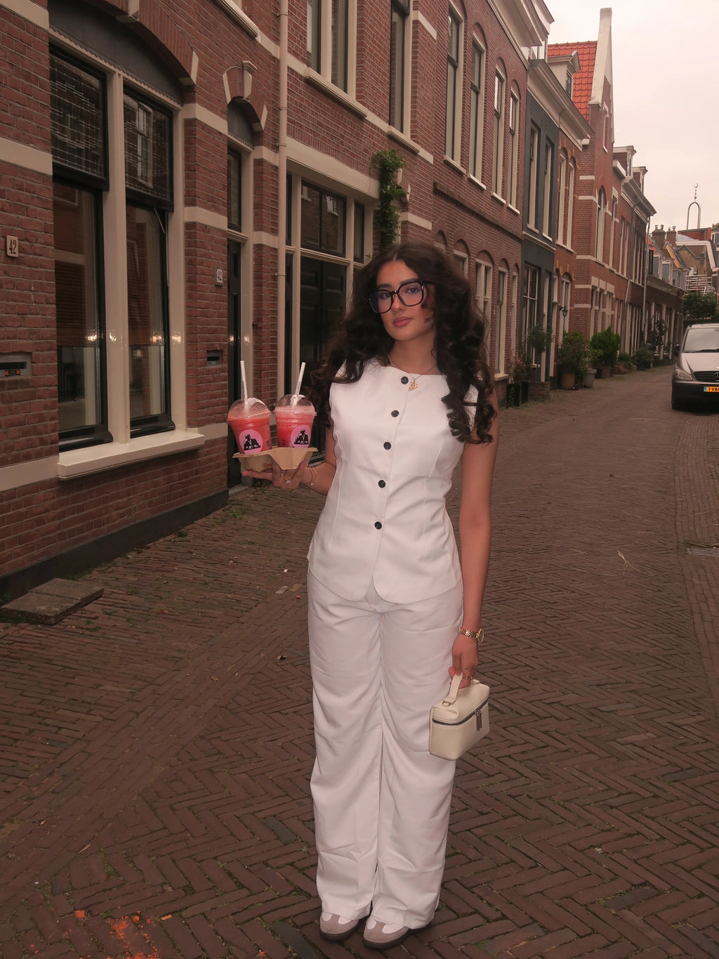 Tweedelige set voor dames met mouwloze top en broek wit